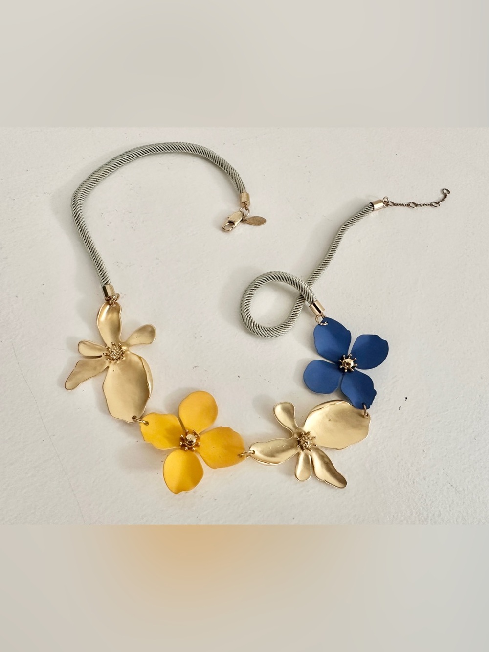 OLIVER BONAS 🌼 Sculptural Gold Floral Necklace with Blue and Yellow Flowers